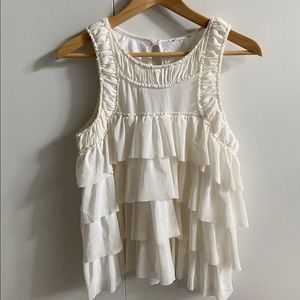Sleeveless cream tiered blouse w shirring accents